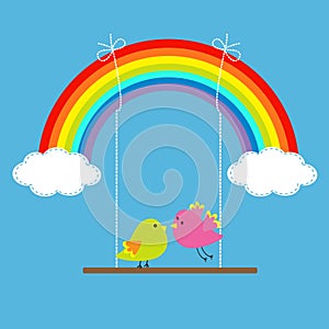 Rainbow, two clouds in the sky and birds on the swing. Dash li