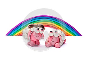 Rainbow and two plasticine sheep.