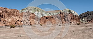 Rainbow Valley Valle Arcoiris, in the Atacama Desert in Chile. The mineral rich rocks of the Domeyko mountains give the valley t