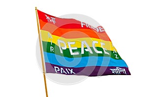 Rainbow varicolored pacifist flag with multilingual peace text i