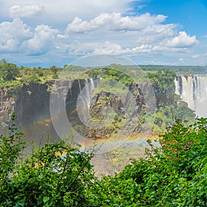 Rainbow at the Victoria Falls on Zambezi River, border of Zambia and Zimbabwe