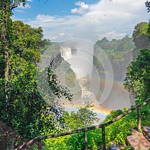 Rainbow at the Victoria Falls on Zambezi River, border of Zambia and Zimbabwe