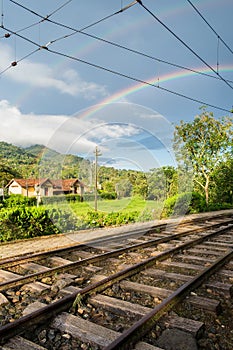 Rainbow and a view of the train tracks at Eugenio Lefevre train station - Santo Antonio do Pinhal, Sao Paulo state, Brazil