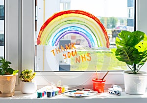 Rainbow on window during quarantine at home