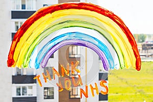 Rainbow on window during quarantine at home