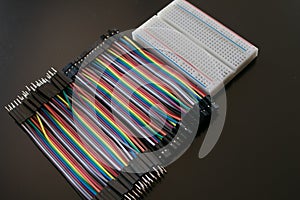 Rainbow wires and Breadboard.