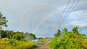 Rainbows decorate the Manokwari sky after the rain