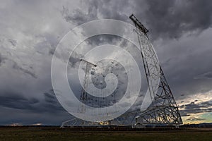 rainclouds on the sky with a high antenna