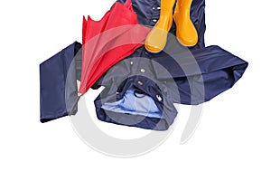 Raincoat and umbrella and rubber boots on a white background. photo