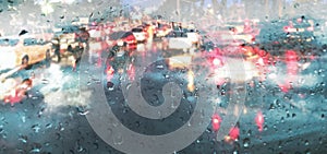 Raindrop on car mirror in rainy season rain background