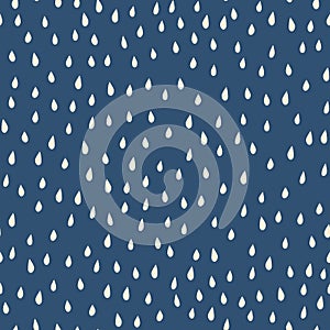 Raindrops beige white on blue background seamless vector pattern