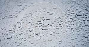 Raindrops on glass car for texture and background