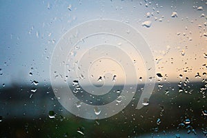 Raindrops on the glass. Rainy weather, overcast, rain, thunderstorm. Window