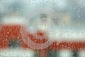 Raindrops on glass, wet glass texture