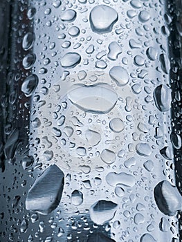 raindrops on metal surface in rainy days