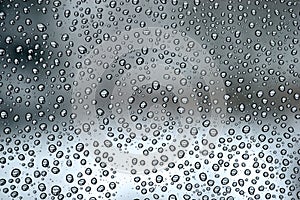 Raindrops on a pane of glass