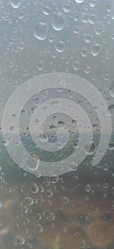 Raindrops on a plastic surface.