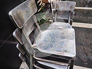 Raindrops on Shiny Metal Chair