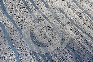 Raindrops on a vehicle hood