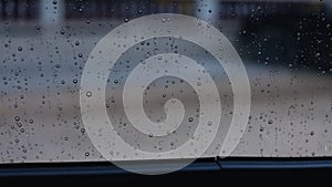 Raindrops on windscreen background in rainy season