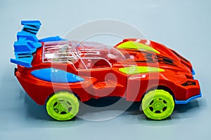 raing car. sport car, toy sport car on a gray background.