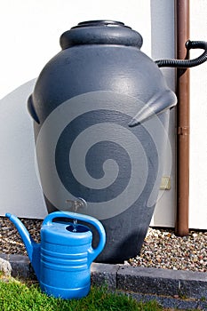 Rainwater barrel downspout modern design house exterior