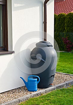 Rainwater barrel downspout modern design house exterior