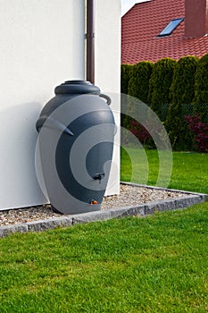 Rainwater barrel downspout modern design house exterior