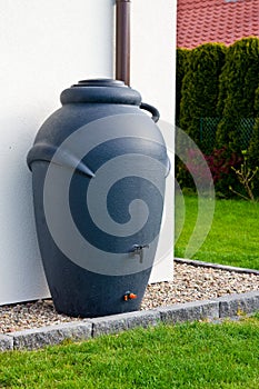 Rainwater barrel downspout modern design house exterior