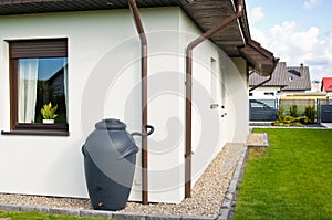 Rainwater barrel downspout modern design house exterior