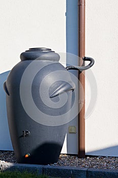 Rainwater barrel downspout modern design house exterior