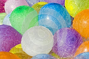 Rainwater over colored balloons