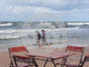 Rainy atmosphere with drops of water on the glass