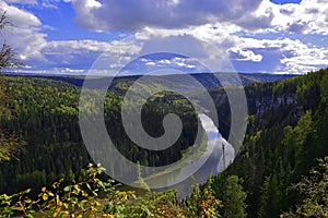 Rainy autumn weather over the Usva River and Usvinskie Stolby Stone