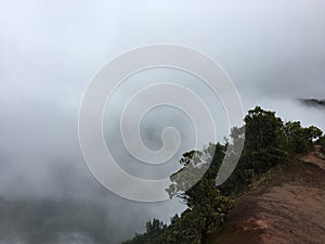 Rainy and Cloudy Day in Winter at Kalalau Lookout in Waimea Canyon on Kauai Island, Hawaii.