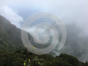 Rainy and Cloudy Day in Winter at Kalalau Lookout in Waimea Canyon on Kauai Island, Hawaii.