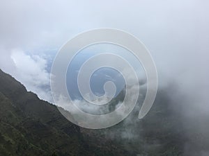 Rainy and Cloudy Day in Winter at Kalalau Lookout in Waimea Canyon on Kauai Island, Hawaii.