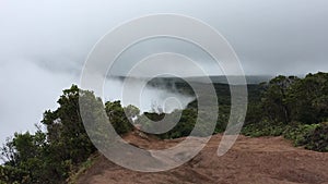 Rainy and Cloudy Day in Winter at Kalalau Lookout in Waimea Canyon on Kauai Island, Hawaii.