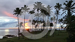 Rainy and Cloudy Sunrise in October in Wailua Bay near Hikinaakala Heiau on Kauai Island, Hawaii.