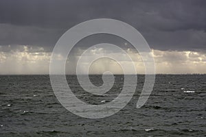 A rainy day, evening on the wadden sea in the Netherlands.