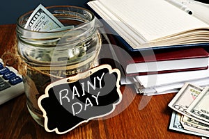 Rainy Day Fund label on the jar with money