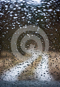 rainy day, rain drops on a car window