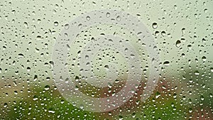 Rainy day - Rain drops on a window glass on a rainy day