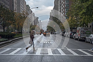 Rainy day street scene at Park Avenue New York City