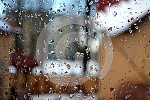 Rainy day. The window in the rain drops. Rainy weather.