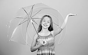 Rainy days coming. Love rainy days. Kid girl happy hold transparent umbrella. Enjoy rainy weather. Invisible protection