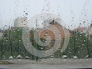 rainy days rain drops on the window surface