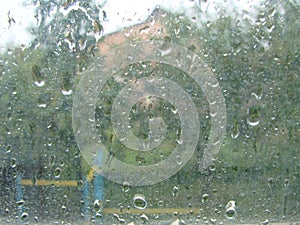 rainy days rain drops on the window surface