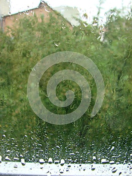 rainy days rain drops on the window surface