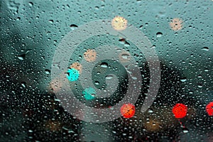 Rainy drop on mirror with bokeh